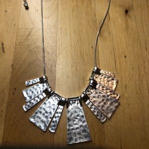 Silver reversible necklace.  Can be worn with hammered side or smooth side out.